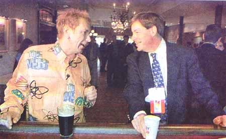 Photo by Suzanne Plunkett, Associated Press.  Johnny Rotten, left, formerly of the rock band The Sex Pistols, and Ohio Republican Representative John Kasich, talk Monday at a Philadelphia pub, during a reception sponsored by the College republican National Committee.