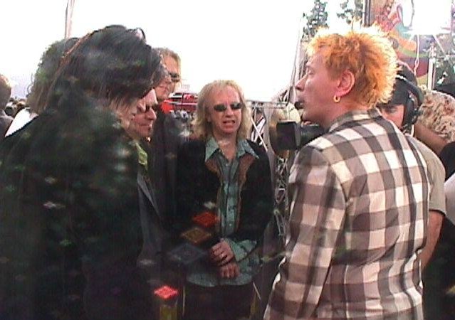 John v's Areosmith: The Grammies, February 1999 Source unknown