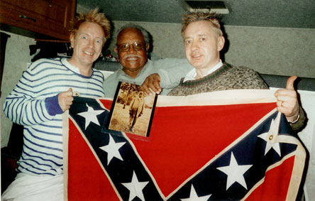 Rotten & Rambo with Nelson Winbush. Rambo is holding a picture of Louis Napoleon Winbush, Nelson's Grandfather. © Rambo Feb 2007