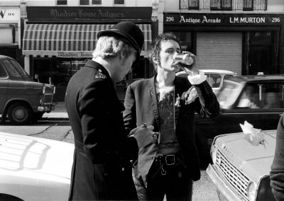 John Rotten stopped by Police in Westbourne Grove, May 23rd 1977 (photo © Barry Plummer)